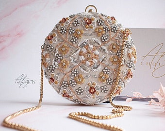 Pale gold clutch bag designer clearance