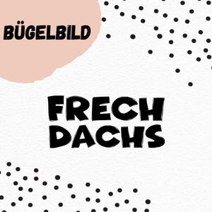 Può includere: Trasferimento a caldo con testo nero che recita "FRECH DACHS" su sfondo bianco con pois neri. L'angolo in alto a sinistra presenta una forma color pesca con il testo "BÜGELBILD" in nero.