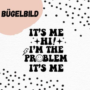 May include: Black and white iron-on transfer with the text "It's me, hi! I'm the problem, it's me" in a retro font. The text is surrounded by small black stars and a lightning bolt.