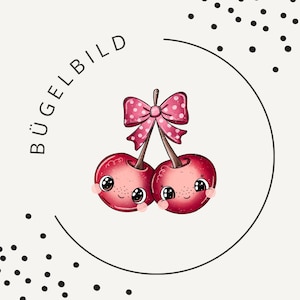 May include: A cartoon illustration of two red cherries with smiling faces and a pink polka-dot bow. The cherries are inside a black circle with the word "BÜGELBILD" in a semi-circle above them. Black dots are scattered around the circle.