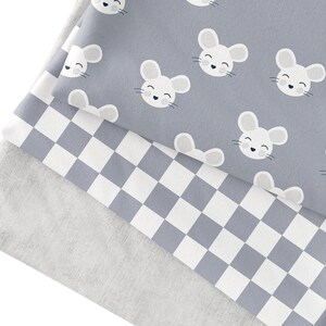May include: Three layers of fabric, the top layer is a light gray fabric with a white mouse pattern, the middle layer is a gray and white checkered fabric, and the bottom layer is a solid light gray fabric.