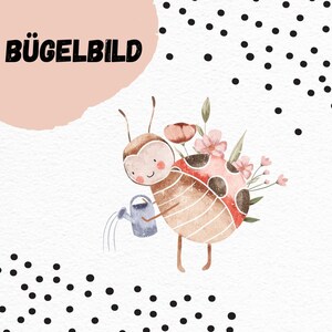 May include: Iron-on patch featuring a cartoon ladybug with pink and red flowers, holding a blue watering can. The text "BÜGELBILD" is in the upper left corner.