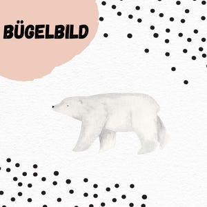 Könnte beinhalten: Illustration eines weißen Eisbären mit dem Text "BÜGELBILD" in Schwarz, vor einem weißen Hintergrund mit schwarzen Punkten und einer rosa Form. Der Bär geht nach rechts.