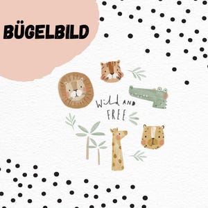 May include: A white background with watercolor illustrations of a lion, tiger, crocodile, giraffe, and bear. The phrase "Wild and Free" is written in cursive. The German text "BÜGELBILD" is in a black, bold font.