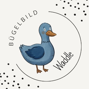Puede incluir: Una ilustración de un pato azul con pico marrón y patas naranjas, encerrada en un marco circular. El texto BÜGELBILD está impreso en negro a lo largo de la curva superior izquierda, y la palabra Waddle está impresa en negro a lo largo de la curva inferior derecha.