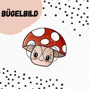 Peut inclure: Illustration d'un champignon souriant avec des lunettes, un chapeau rouge à pois blancs. Le texte "BÜGELBILD" en noir est visible. Fond blanc avec des points noirs et une forme rose.
