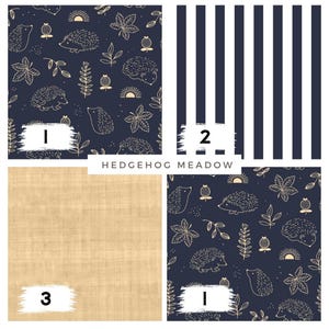 Peut inclure: Échantillons de tissu avec différents motifs. L'un présente un fond bleu marine avec des hérissons et des feuilles dorées. Un autre présente des rayures verticales bleu marine et blanches. Un troisième affiche une texture de lin beige.