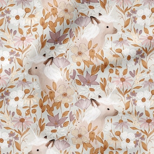 May include: A seamless pattern featuring white unicorns with brown horns and bodies, surrounded by a variety of flowers in shades of pink, white, and brown. The background is a light beige.