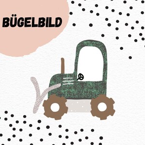 May include: Green tractor iron-on patch with the text "BÜGELBILD" on a pink background with black polka dots.