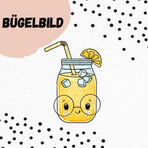 May include: A whimsical illustration of a yellow lemonade drink in a mason jar with a smiling face wearing glasses. The jar has a straw and a lemon slice. The text "BÜGELBILD" is at the top left.