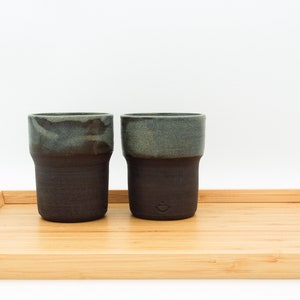 Green-brown medium ceramic cup