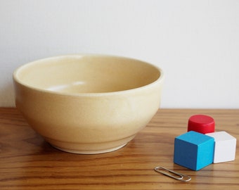 Beige wheelthrown ceramic bowl