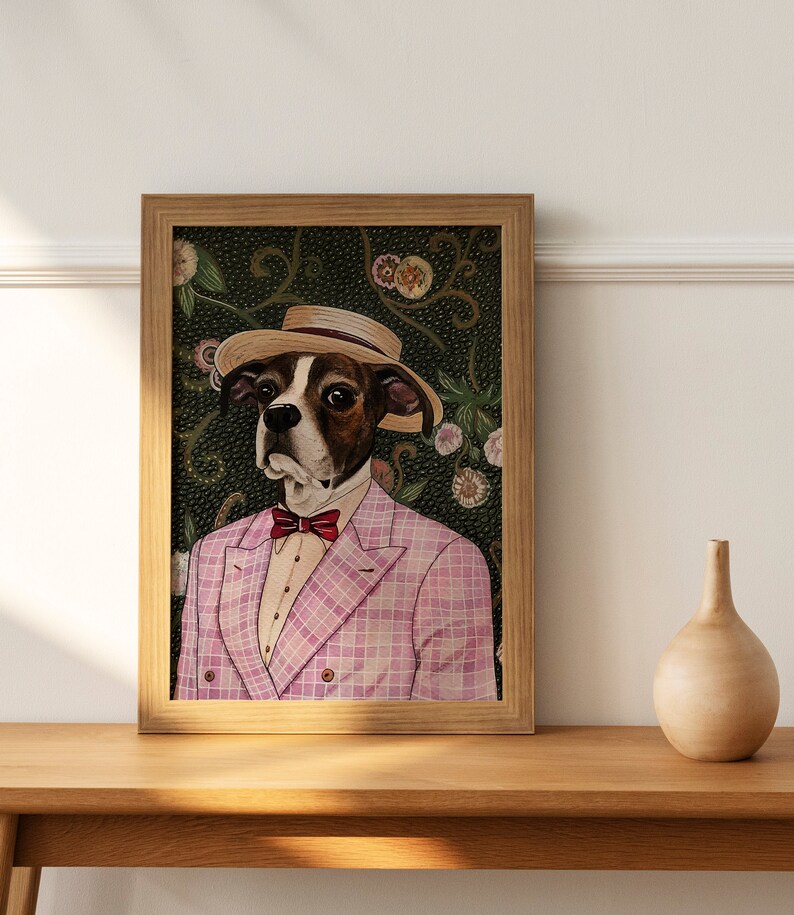 May include: A framed illustration of a dog wearing a pink plaid suit, a bow tie, and a straw hat. The dog is set against a green background with floral patterns.