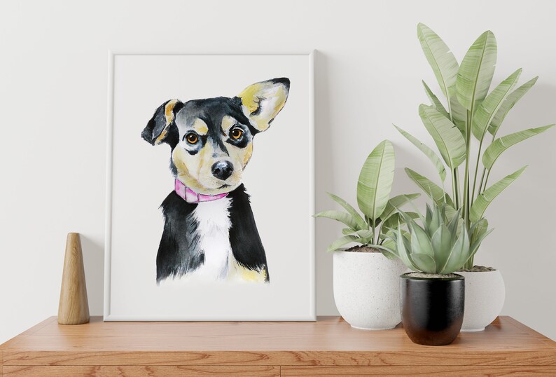 May include: Watercolor painting of a black, brown, and white dog with a pink collar. The dog is looking directly at the viewer with one ear perked up.