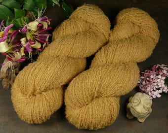 NUVIE RUBIN - weiches  Merino Bouclé, Lauflänge 450 Meter, (230 EUR/kg)