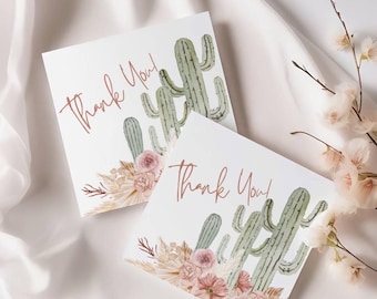May include: Two white thank you cards with a watercolor illustration of cacti and pink flowers. The text "Thank You" is written in a copper colored font.