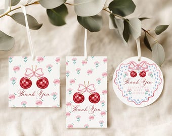 May include: Three gift tags with a cherry theme. The tags feature red cherries with pink bows, floral patterns, and the words "Thank You". One tag is round, and two are rectangular.