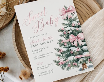 May include: A rectangular baby shower invitation card featuring a watercolor illustration of a snow-covered Christmas tree decorated with pink bows and ornaments. The text reads Sweet Baby, Sarah Smiths Baby Shower, December 12, 6:00 PM, 327 Latigo Canyon Rd. Malibu, CA, Rsvp by 11.12 to Kelly 123.456.7890, Registered at Babylist.com.