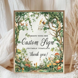 May include: A framed sign with a whimsical forest scene, featuring trees, mushrooms, and butterflies. The sign reads "Create Your Own Custom Sign, Editable Template, thank you!" in elegant script. The frame is gold.