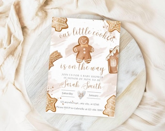 May include: A gingerbread-themed baby shower invitation with a gingerbread man illustration and the text "our little cookie is on the way". The invitation includes the date, time, and location of the shower.
