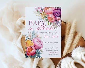 May include: A baby shower invitation with a floral design. The invitation says "Baby in Bloom" and includes the date, time, and location of the shower. It also says "Join us for a baby shower in honor of Mom to be Naomi Smith".