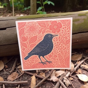 Beautiful  print of a Linocut Card – Blackbird & Floral Folk Art Print – Handmade Nature-Inspired Block Print on Textured White Card