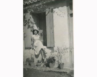 Young woman in the yard of her house. Greece 1950s. Vintage photo  [53707]