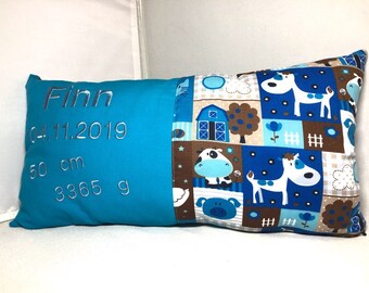 Cuddly pillow with birth dates animals