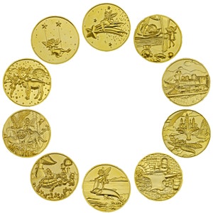 May include: Twelve gold-colored round tokens with various images, including fairies, a train, a castle, and a mushroom. The tokens are arranged in a circle on a white background.