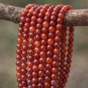 Achat Perlenstrang 6 - 6,4 mm gefärbt rot (ca. 64 Perlen / ca. 38 cm Länge)