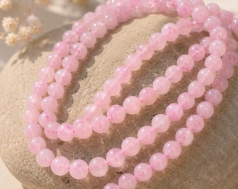 Natural rose quartz bead strand, round, smooth, shiny, 4 - 4.5 mm (approx. 85 beads / approx. 39 cm length)