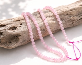 Natural rose quartz bead strand, round, smooth, shiny, 4-4.5 mm (approx. 85 beads / approx. 39