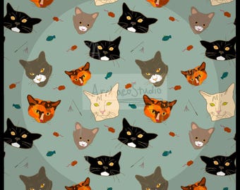 May include: A repeating pattern of cat faces in various colors, including black, orange, tan, and gray, on a teal background. The design includes small fish and mouse illustrations. The overall theme is a whimsical cat-themed design.