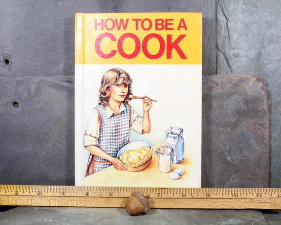 1979年 スザンナ・ブラッドリー著『How To Be A Cook』 | 1979年