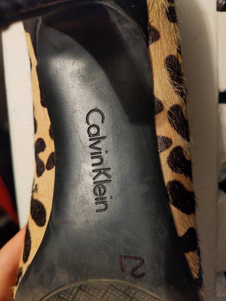 Calvin klein best sale animal print shoes