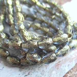10 Bohemian glass olives 7 x 5 mm cadet blue transparent etched finish gold-coloured finish glass beads original czech beads glass beads