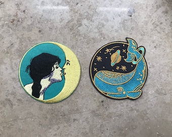 Iron on patch round, girl kisses moon or cosmic whale