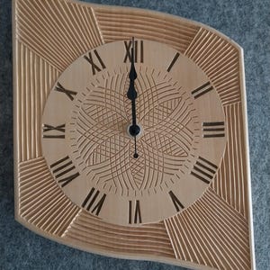 Hand-carved clock with radio-controlled movement.