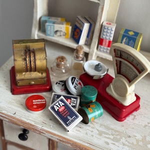 Vintage toy shop set with old GEOBRA scales and antique ANFOE toy cash register & decorative accessories | Germany ±1930