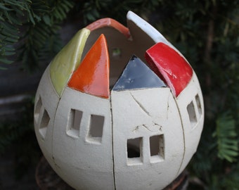 Lantern with houses around, village, candle, tealight