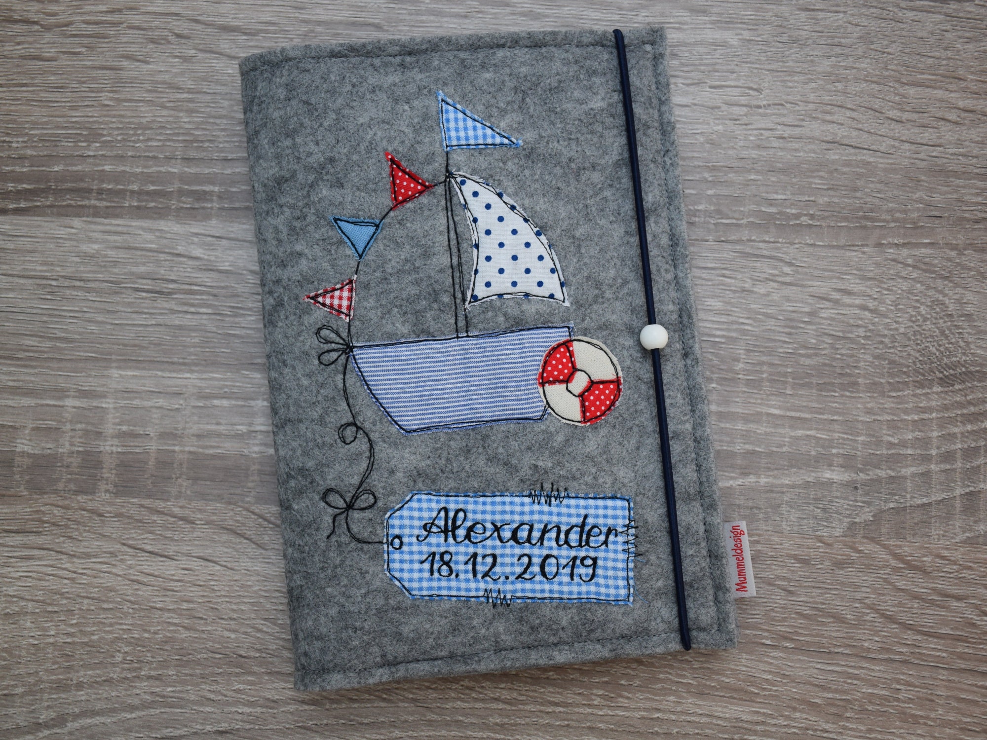 U-booklet cover boat made of felt incl. name, date and 2 inner compar…