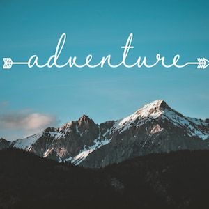 May include: A snowy mountain range with a blue sky and white clouds. The text "adventure" is written in cursive with arrows on either side.