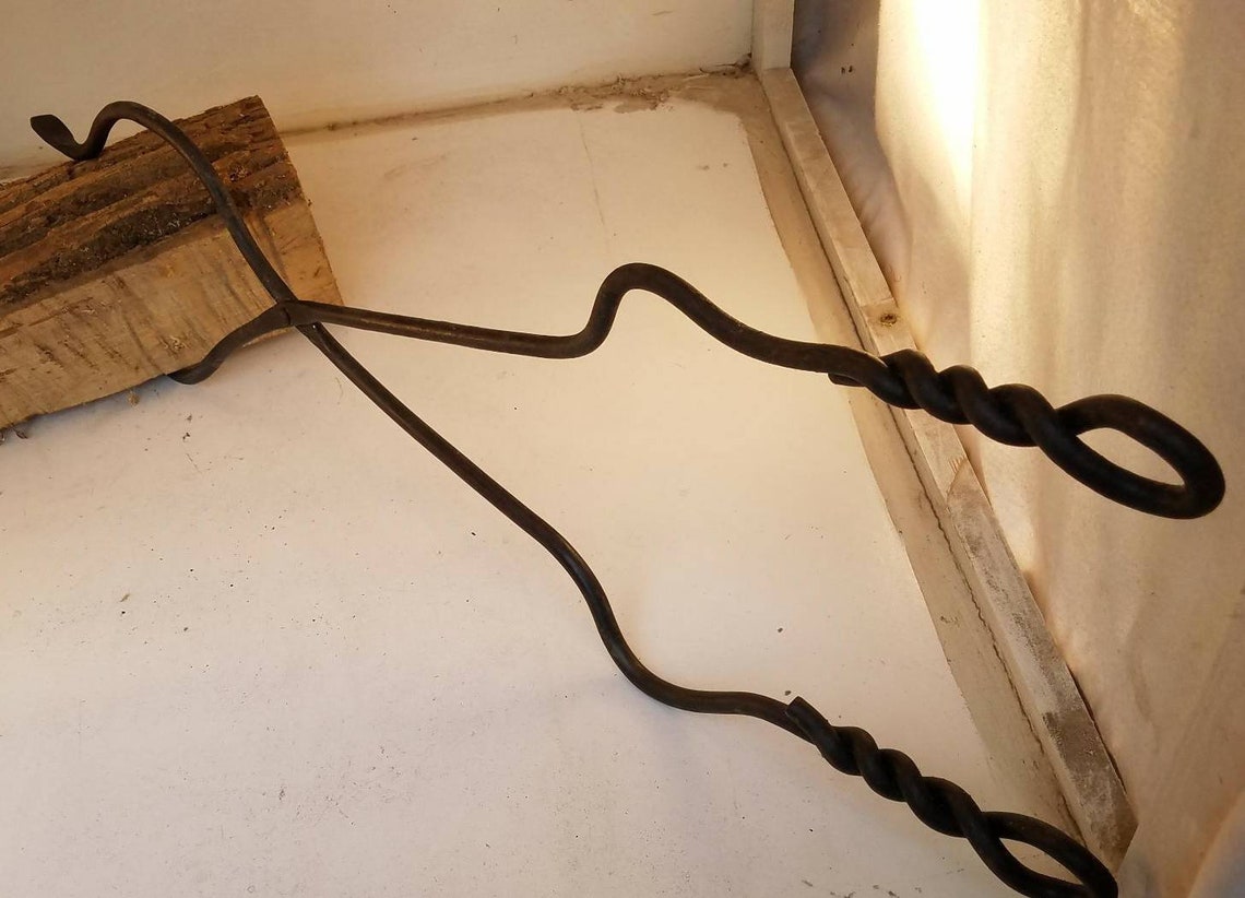 Blacksmith made fireplace tongs. Great for inside fireplace or Etsy