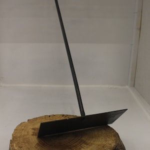 Blacksmith made ash rake,with twisted handle