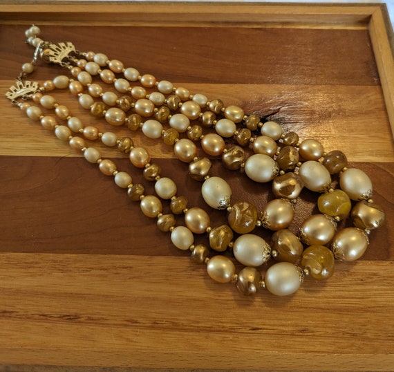 Vintage Triple Strand Gold and Cream Graduated Be… - image 1