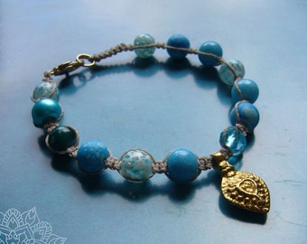 Macrame bracelet, macrame jewelry, micromacrame bracelet, turquoise, aqua, brass pendant, glass beads