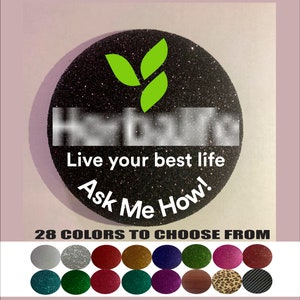 May include: Black glitter round sticker with a green leaf design and the text "Live your best life Ask Me How!"  28 colors to choose from.