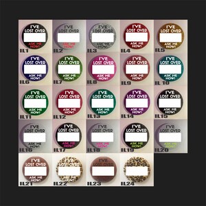 May include: A collection of 24 round buttons with the text "I'VE LOST OVER" and "ASK ME HOW!". The buttons have various colors and patterns, including glitter, solid colors, and animal prints. Each button is labeled with a number.