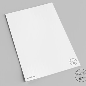 May include: A white sheet of paper with the text "Annelies Art" and "www.annelies-art.de" printed on it.