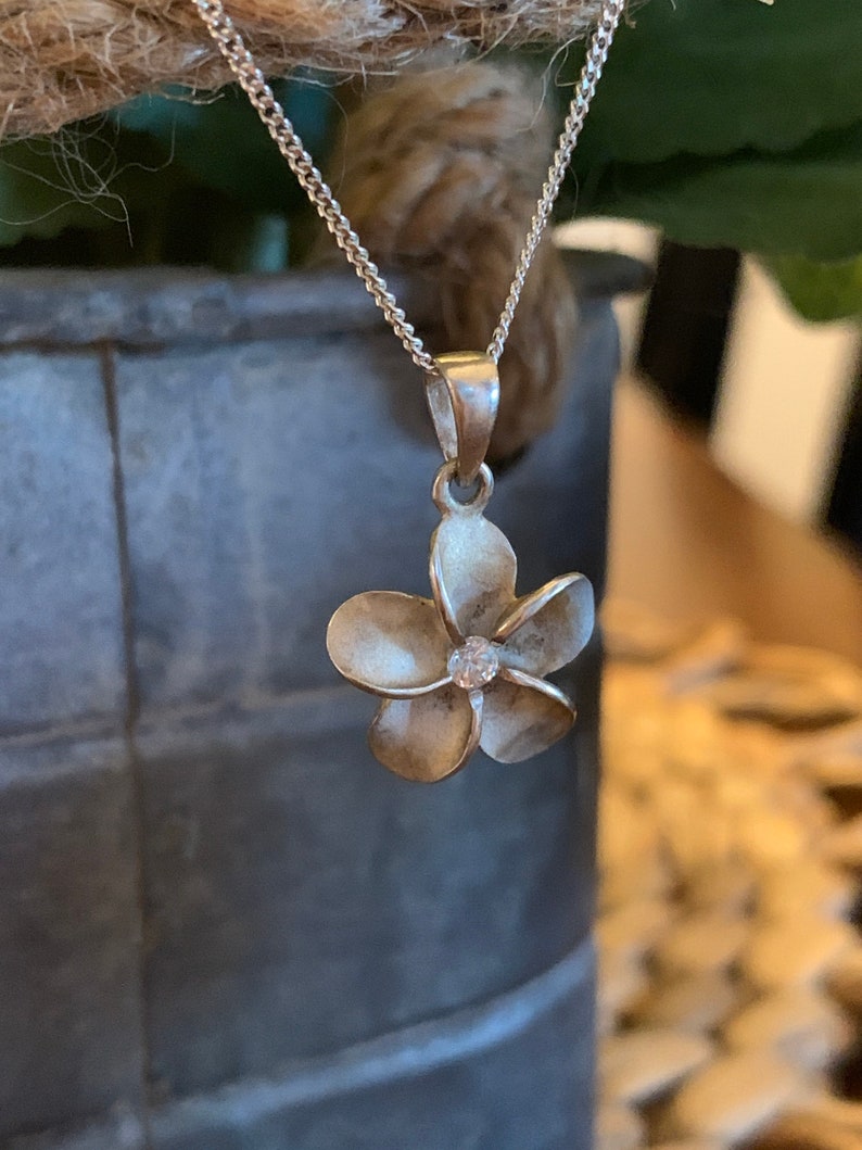 Sterling silver flower with cz necklace